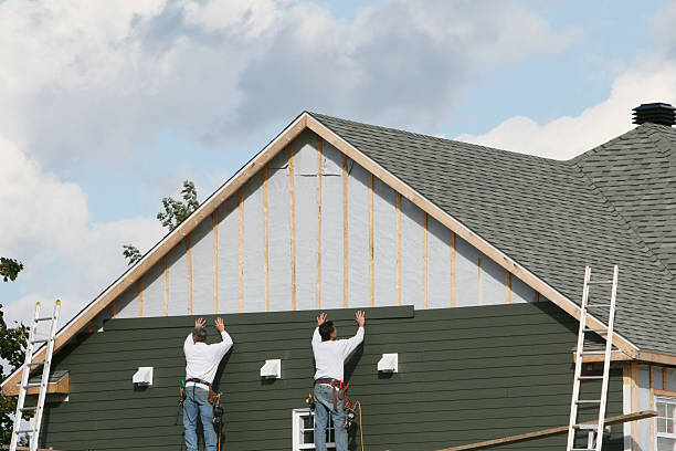 Professional Emergency Siding Repair technician working in Rockville Centre, NY
